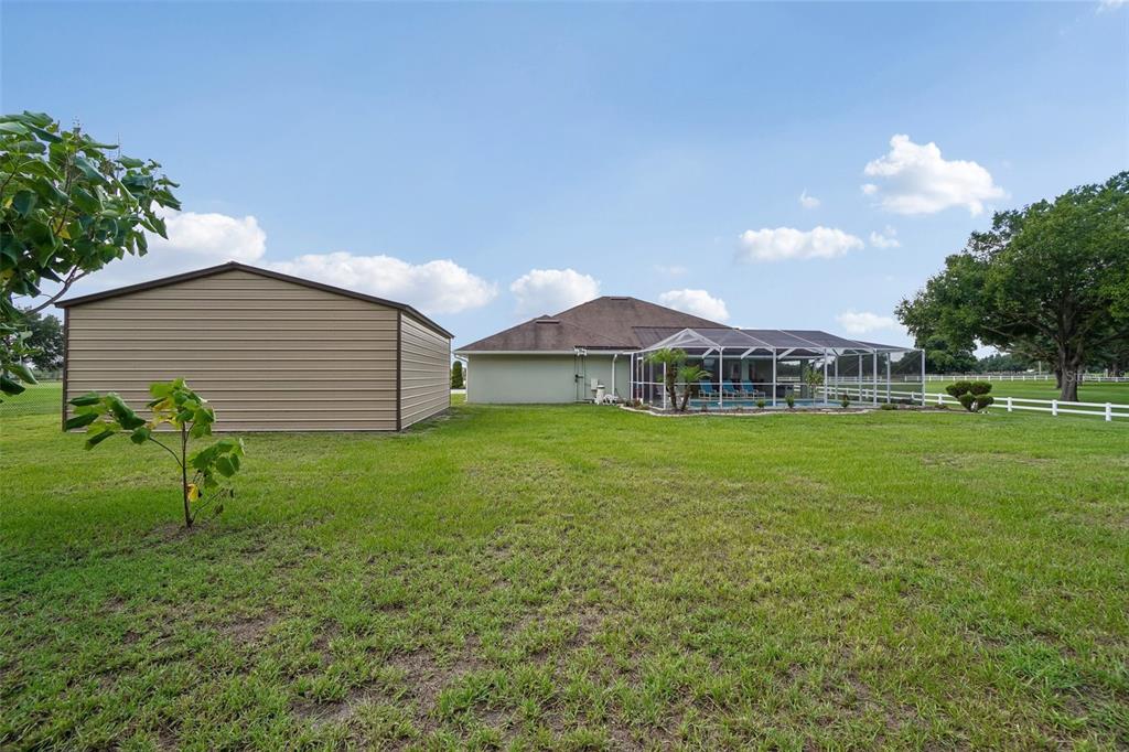 3934 Connersville Road Bartow, FL 33830 - Photo 57 of 81 a view of a house with a backyard