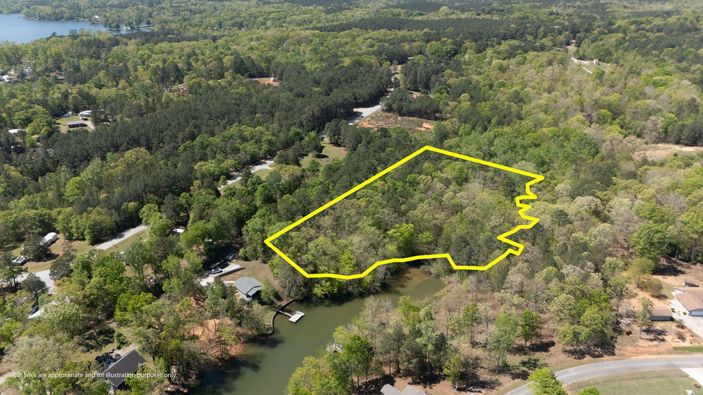 This expansive, wooded property offers serene waterfront living and endless possibilities.