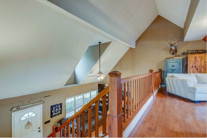 115 East Piney Road Dickson, TN 37055 - Photo 22 of 38 a view of staircase with wooden floor and fan