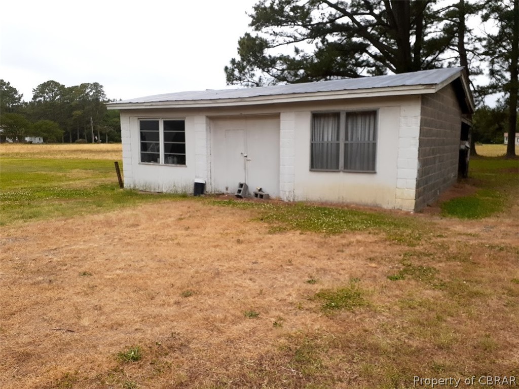 124 Dutchman's Road Port Haywood, VA 23138 - Photo 2 of 8 HAYWOOD GARAGE WITH TOOL SHED IN BACK