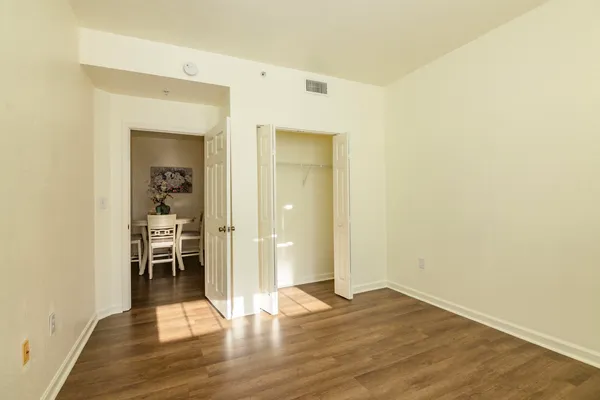 a view of a livingroom with wooden floor