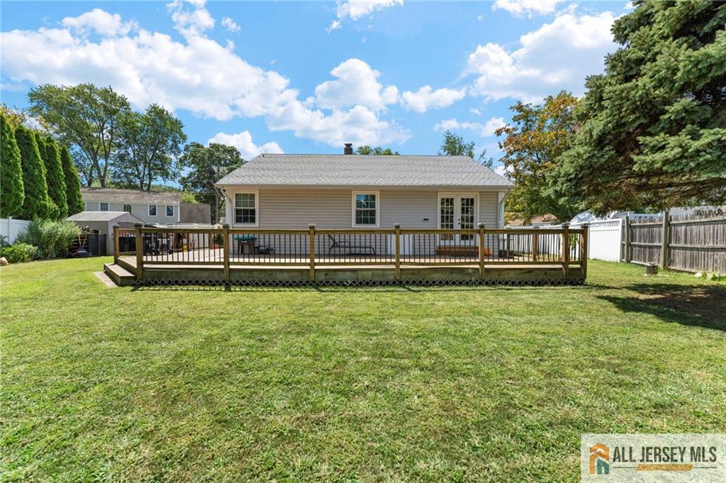 4 Burnham Road East Brunswick, NJ 08816 - Photo 23 of 25 a front view of a house with a yard