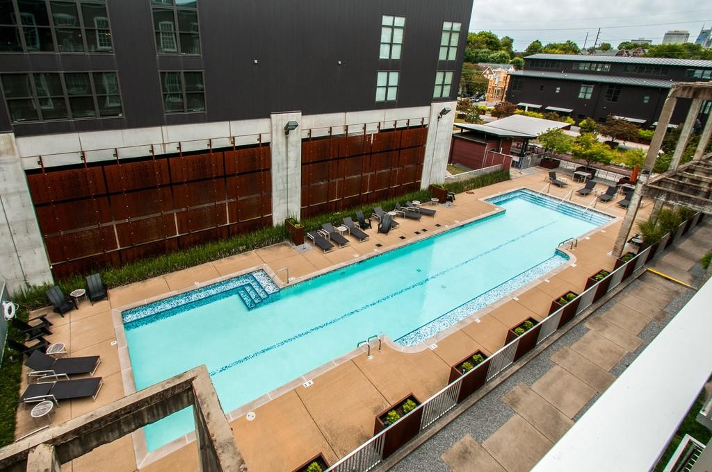 1350 Rosa L Parks Boulevard, Unit 239 Nashville, TN 37208 - Photo 19 of 23 a view of a chairs and table in the patio