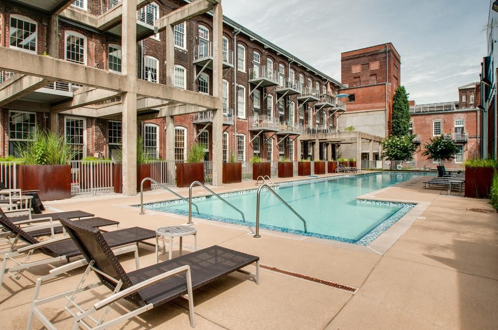 1350 Rosa L Parks Boulevard, Unit 239 Nashville, TN 37208 - Photo 20 of 23 a view of a building with a backyard