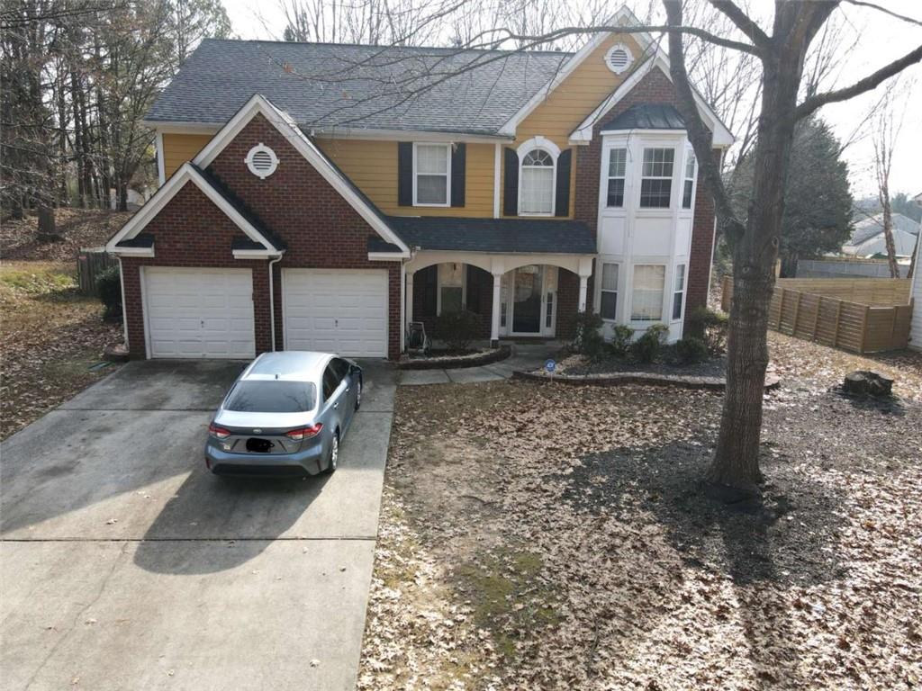 a car parked in front of a house