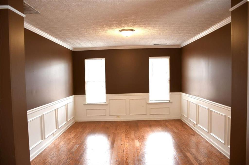 355 Magnolia Walk Lane Atlanta, GA 30349 - Photo 3 of 27 a view of an empty room and window