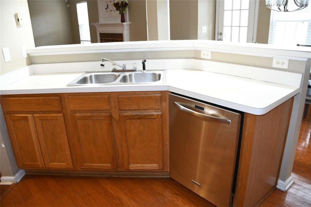 355 Magnolia Walk Lane Atlanta, GA 30349 - Photo 6 of 27 a bathroom with a sink and a mirror