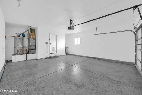 a view of empty room with ceiling fan