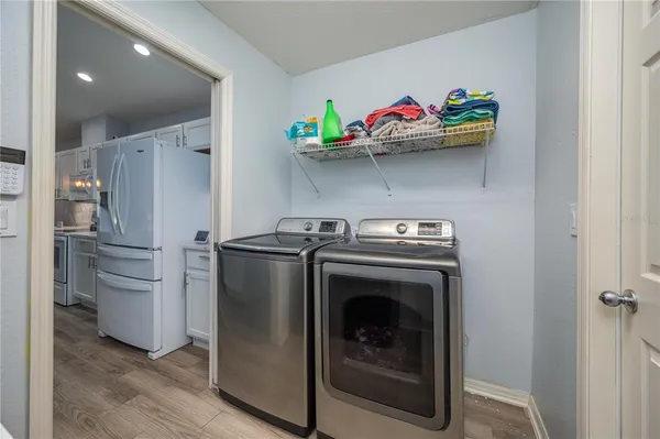 a utility room with dryer and washer