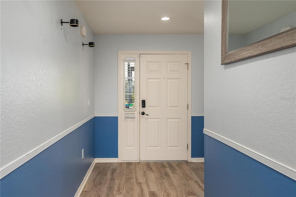 501 Interlock Street Lake Alfred, FL 33850 - Photo 7 of 35 wooden floor in an empty room