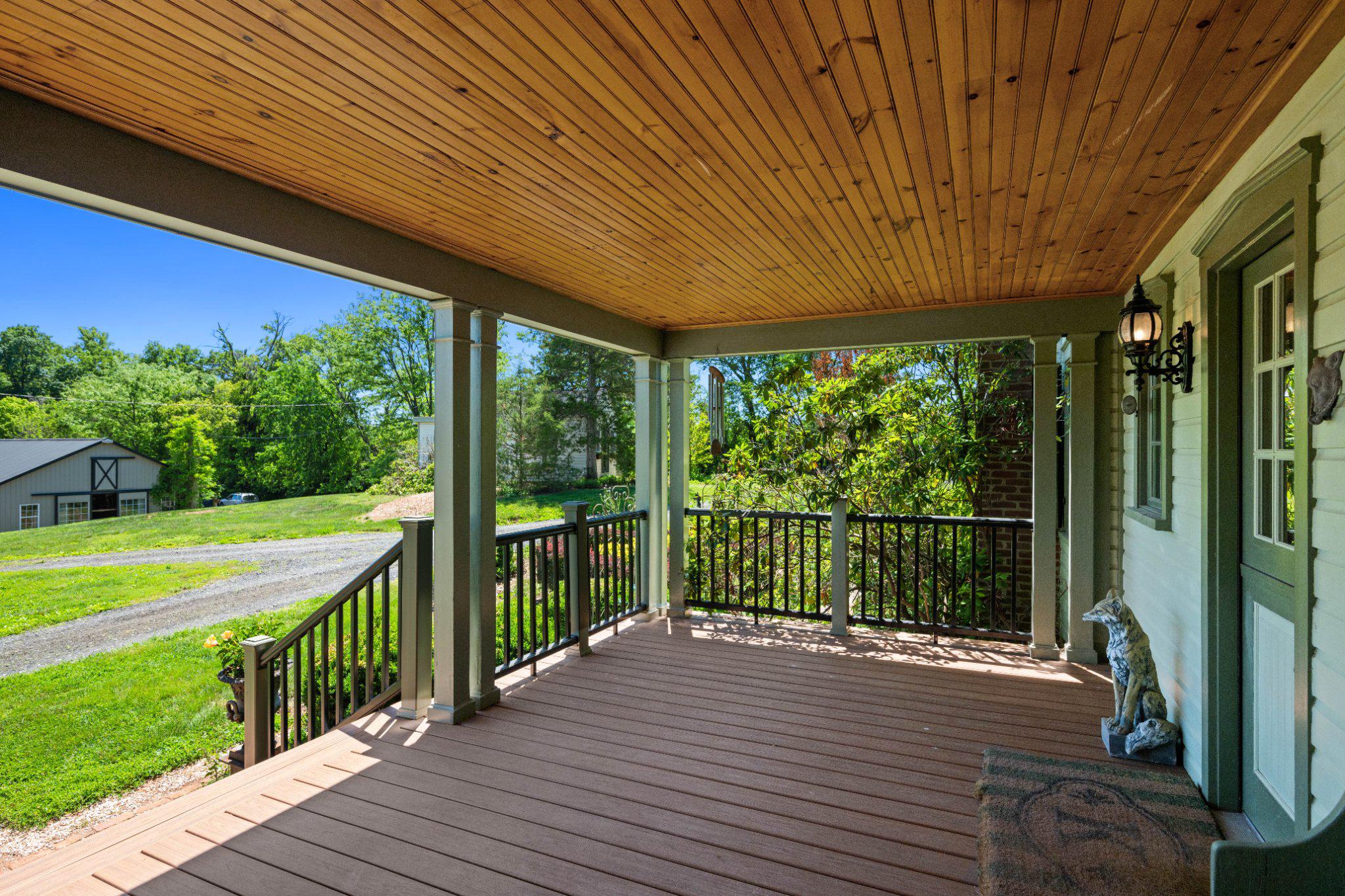 18101 Cattail Road Poolesville, MD 20837 - Photo 59 of 79 Side porch with classic Dutch door
