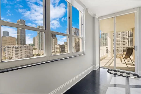 a view of a room with a large window