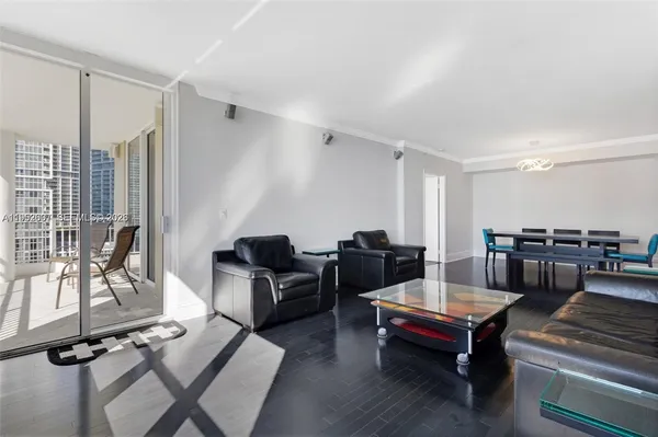 a living room with furniture and a table