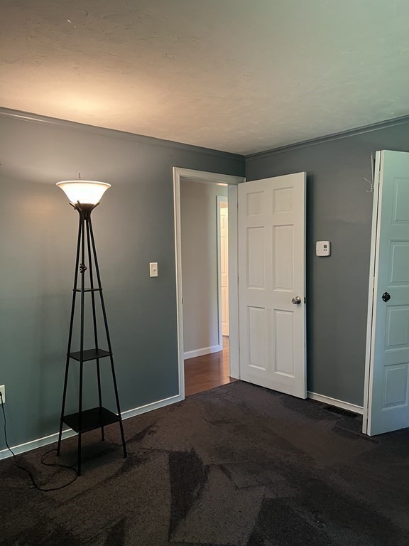 66 Carver Road Plymouth, MA 02360 - Photo 19 of 21 a view of a room with wooden floor and windows
