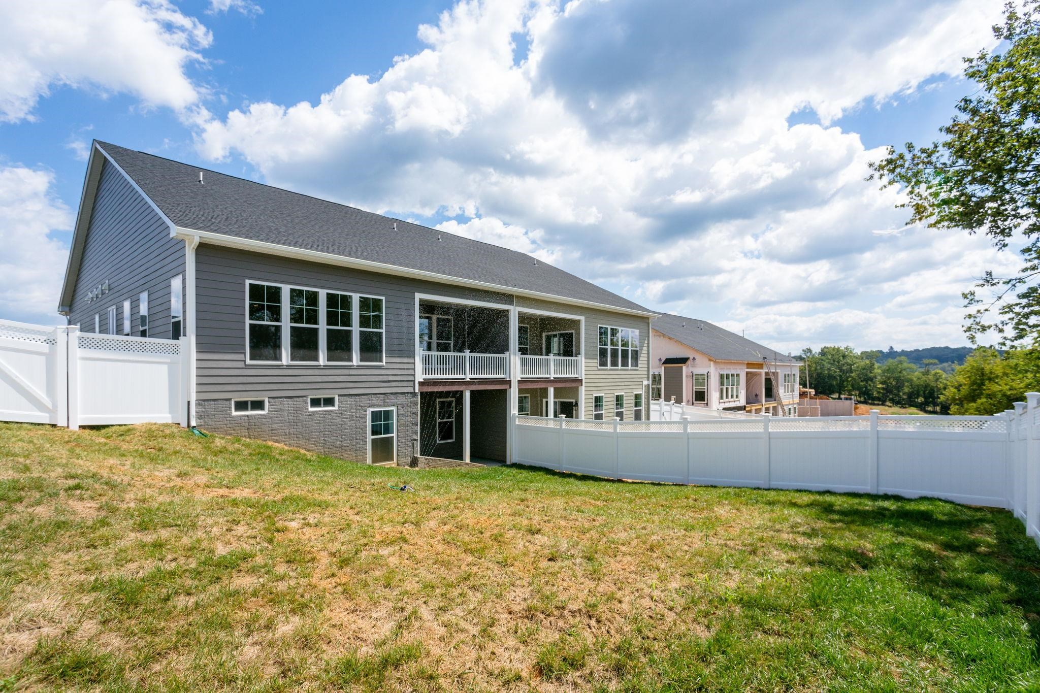 2784 Rutlege Road, Unit 188 Harrisonburg, VA 22801 - Photo 30 of 31 a house view with a garden and wooden fence