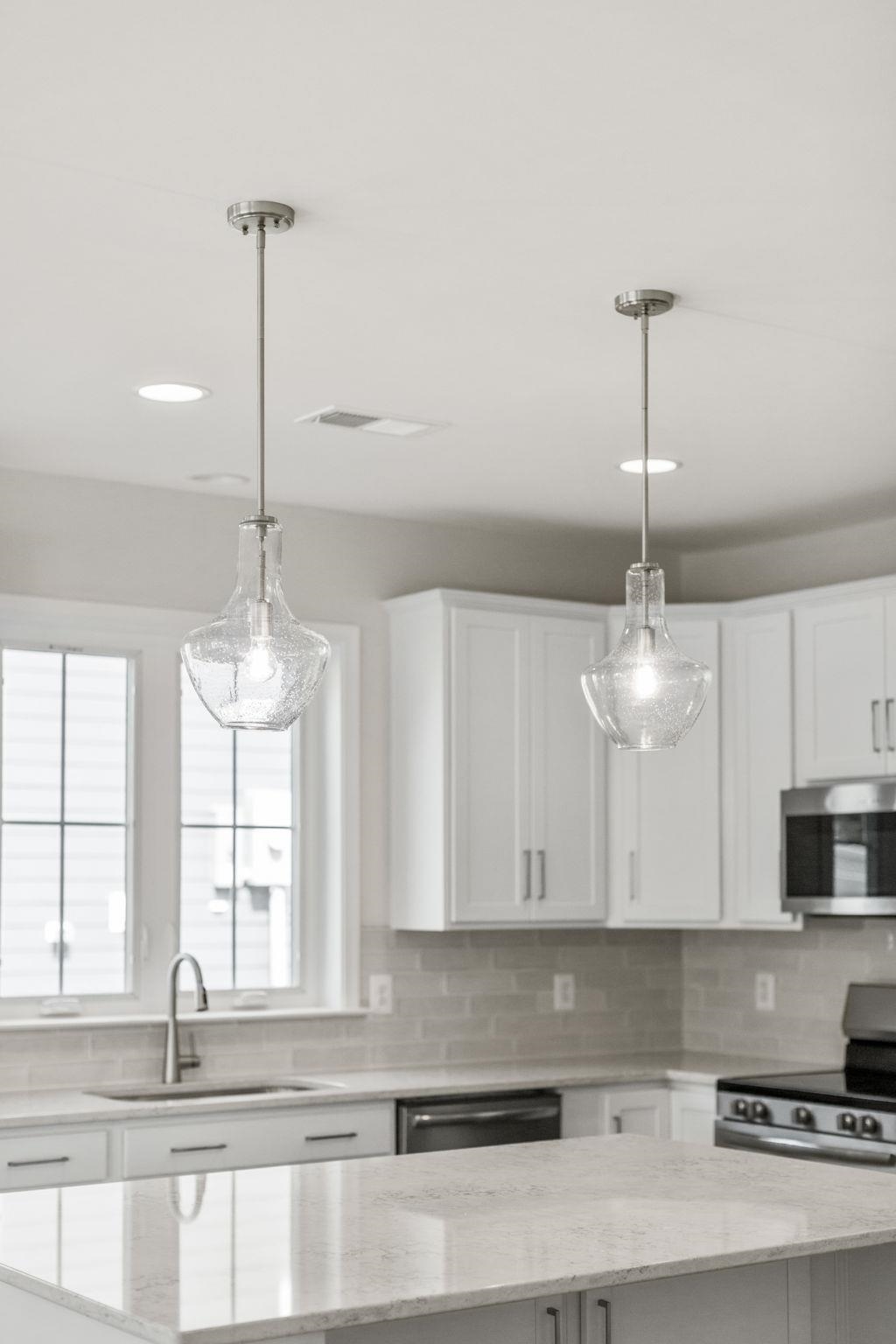 2784 Rutlege Road, Unit 188 Harrisonburg, VA 22801 - Photo 10 of 31 a view of a kitchen with stainless steel appliances granite countertop a sink a window and a wooden floor