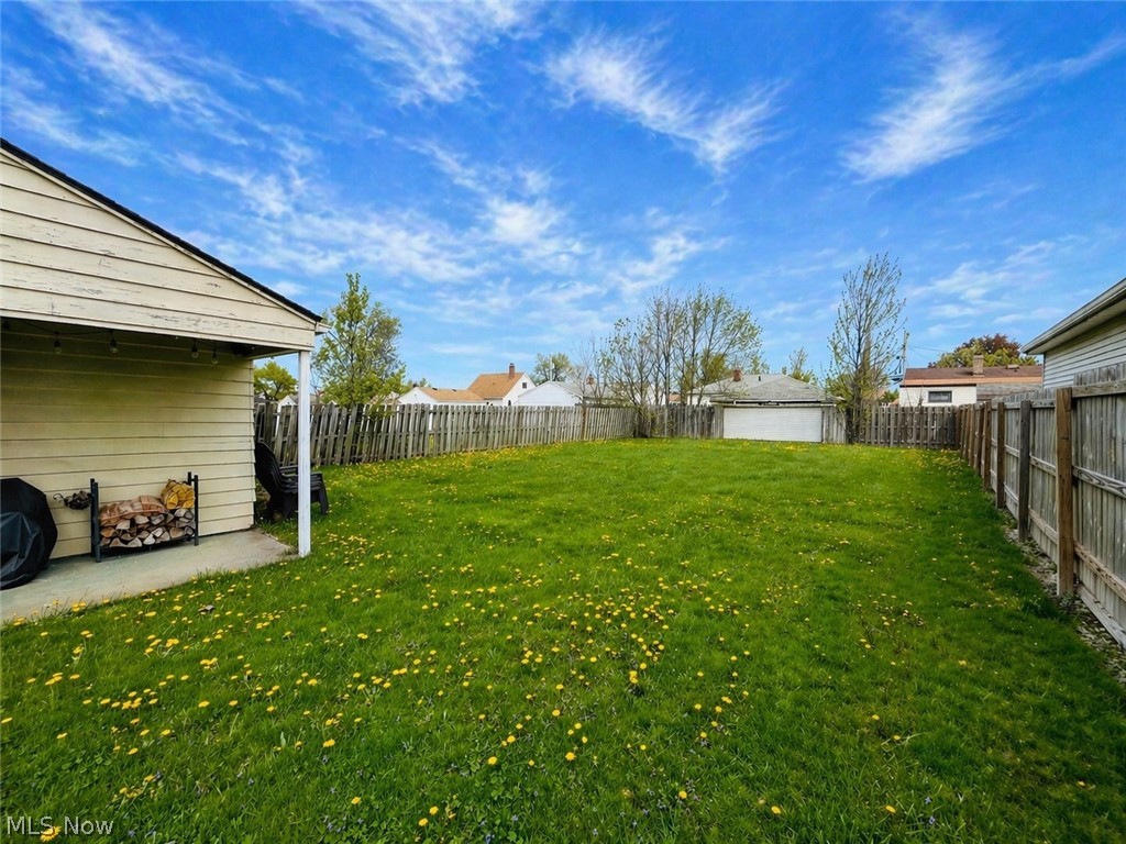 15546 Hummel Road Brook Park, OH 44142 - Photo 40 of 41 Yard with fire pit