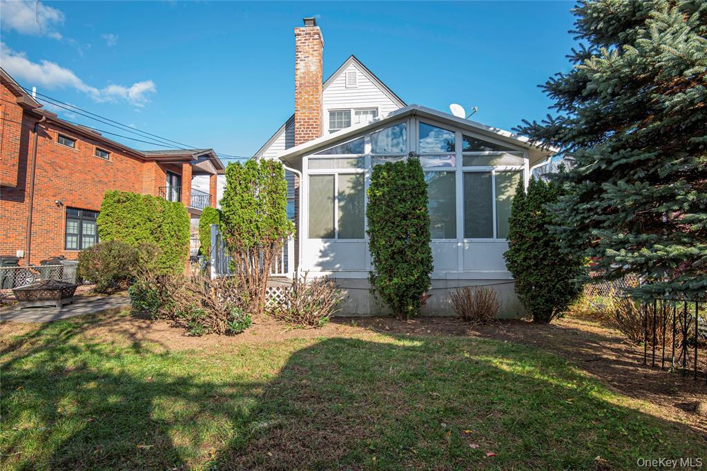 78-36 271st Street Queens, NY 11040 - Photo 17 of 17 a front view of house with a garden