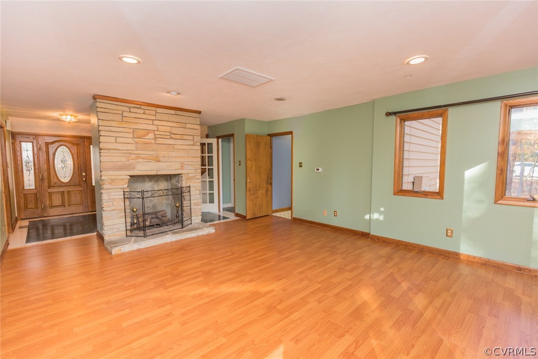 13601 Winterberry Ridge Midlothian, VA 23112 - Photo 7 of 43 a view of an empty room with a fireplace and a window
