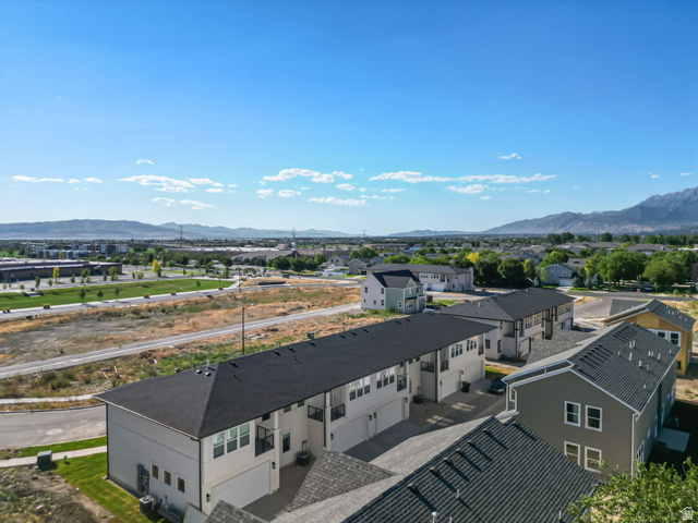 717 South Harrison Drive West Springville, UT 84663 - Photo 27 of 31 Modern townhome-style residences featuring dark shingle roofs and light-toned siding