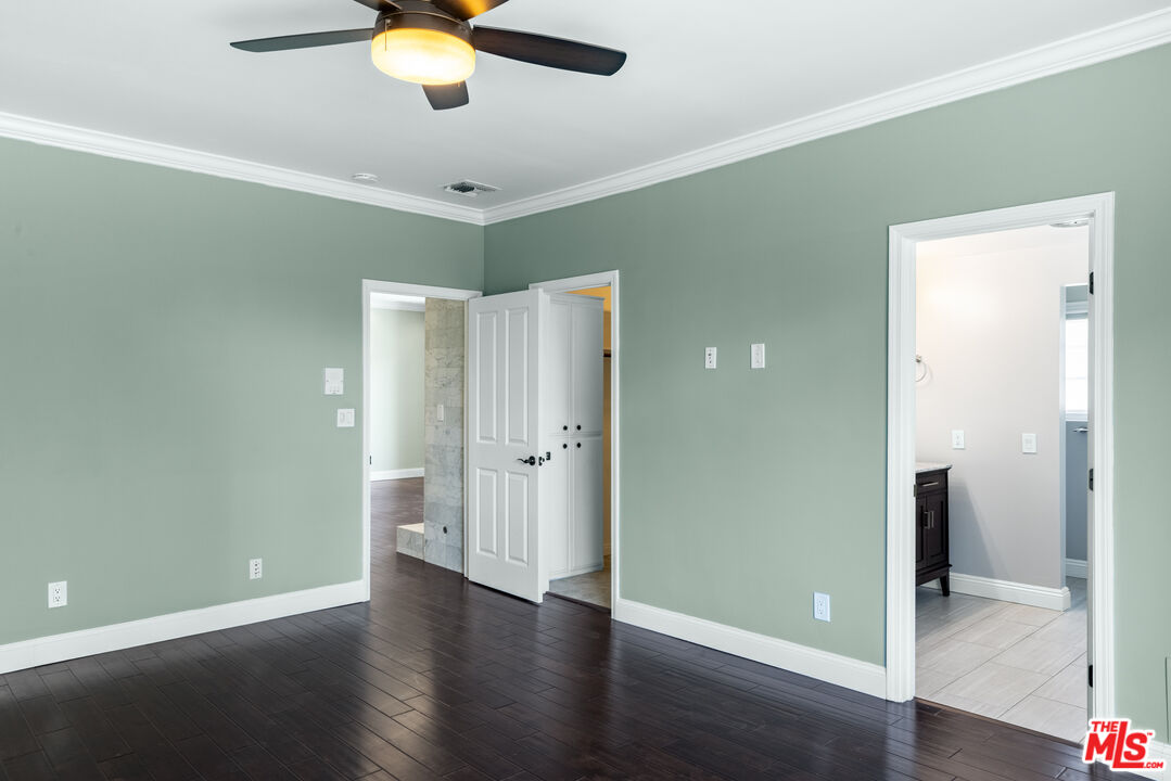 818 6th Street, Unit 102 Santa Monica, CA 90403 - Photo 18 of 29 a view of an empty room with wooden floor
