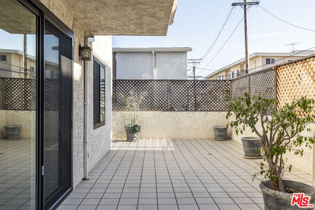 818 6th Street, Unit 102 Santa Monica, CA 90403 - Photo 25 of 29 a bathroom with a sink and a shower
