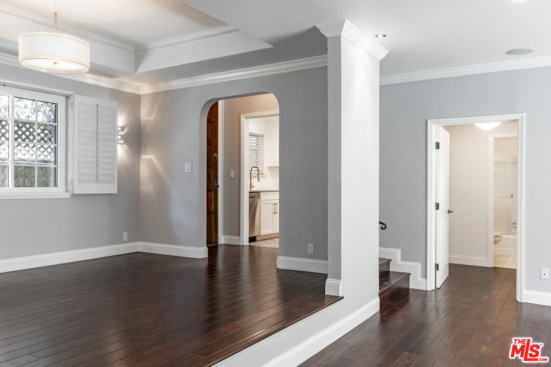 818 6th Street, Unit 102 Santa Monica, CA 90403 - Photo 10 of 29 a view of livingroom with hardwood floor and hallway