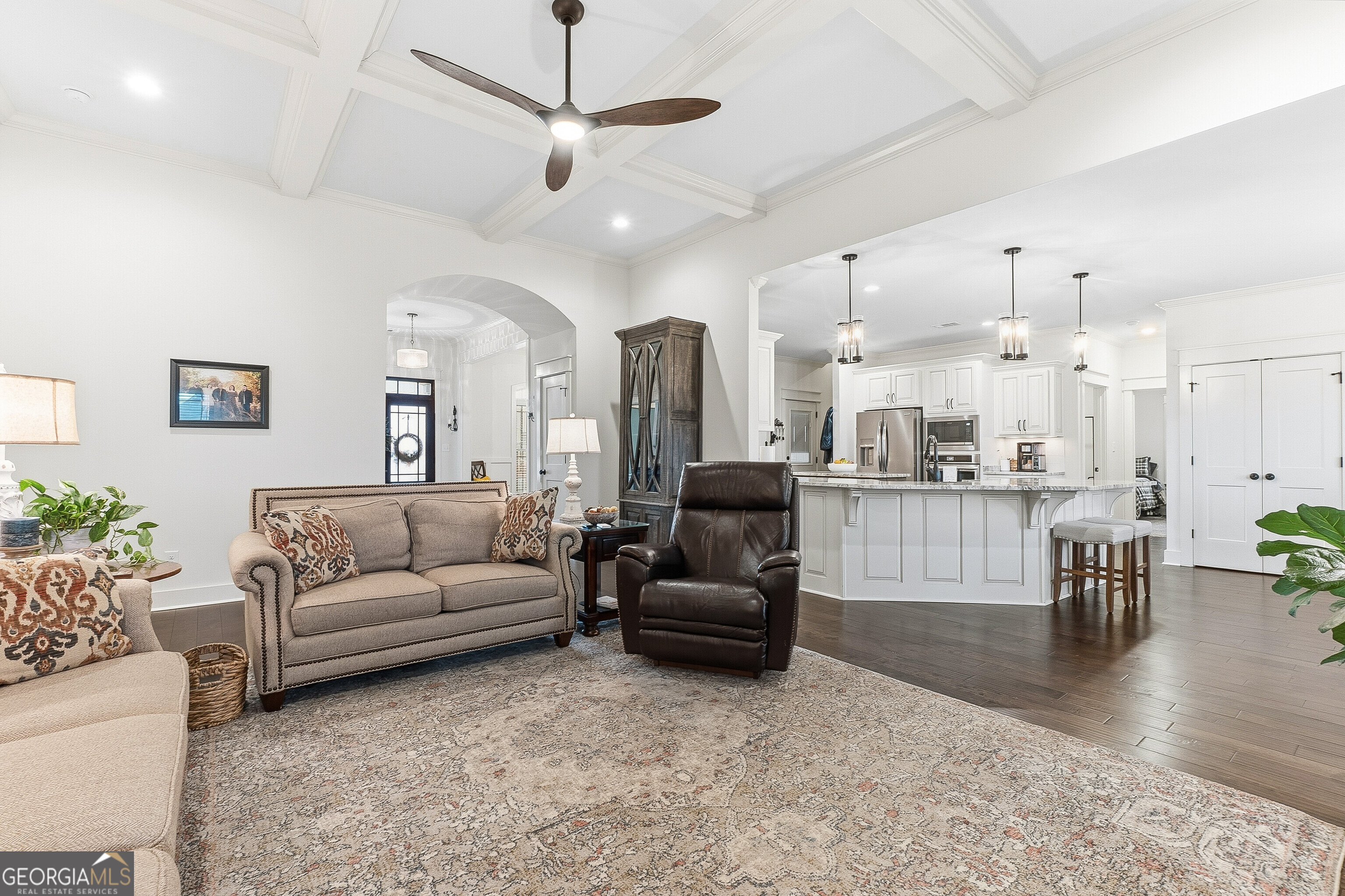 307 Apalachee Way Bonaire, GA 31005 - Photo 16 of 61 a living room with furniture and a view of kitchen