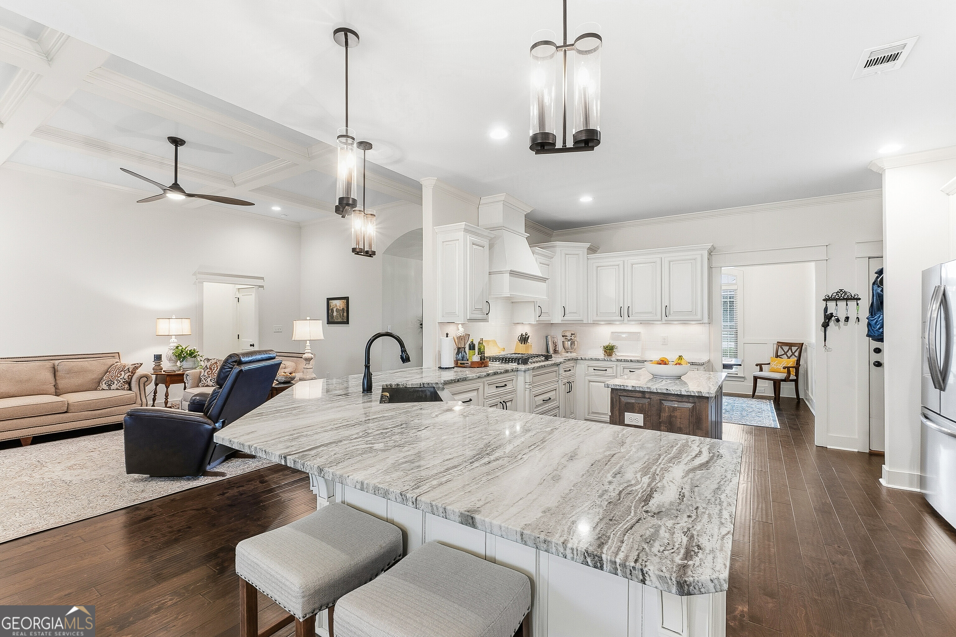 307 Apalachee Way Bonaire, GA 31005 - Photo 19 of 61 a large kitchen with cabinets