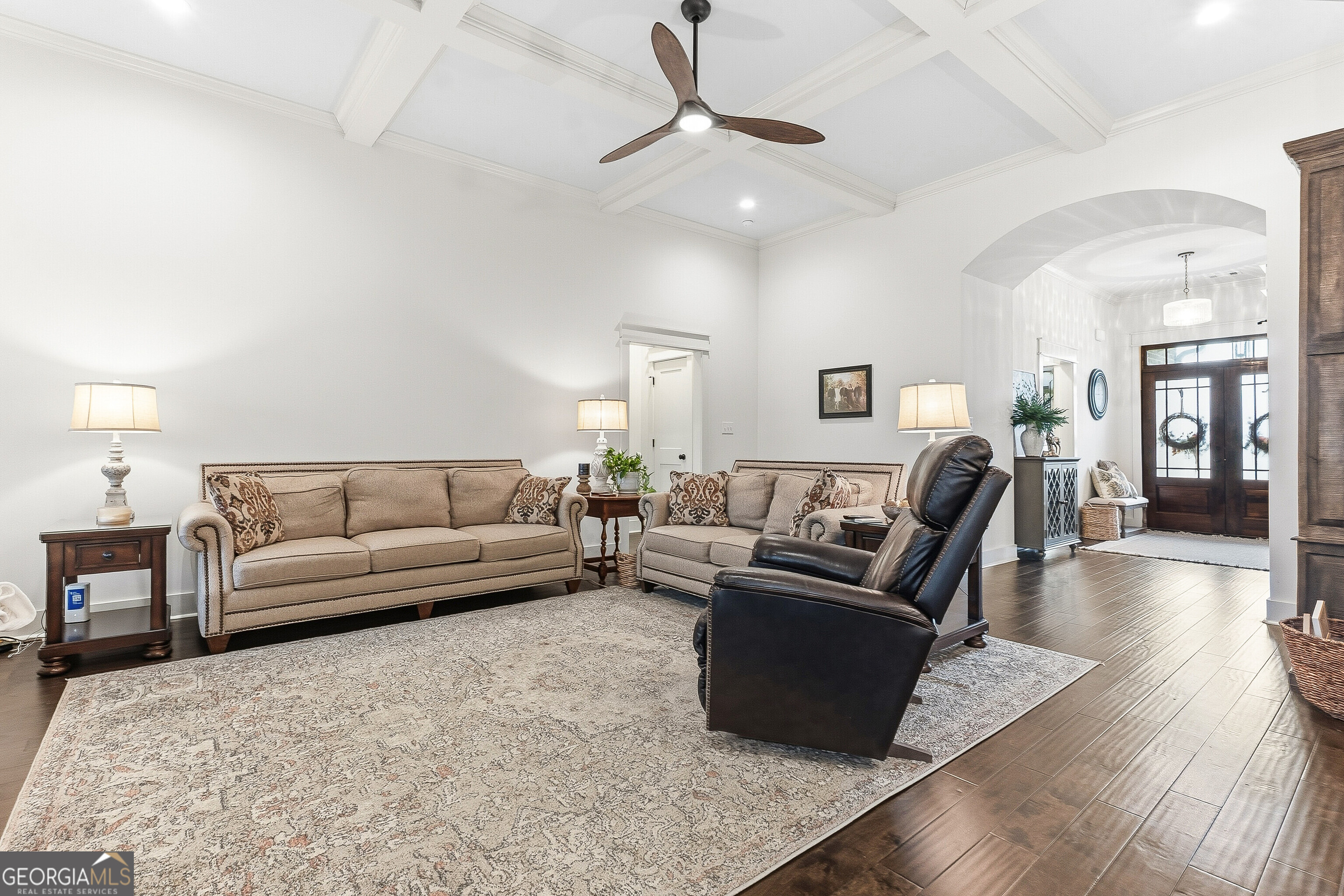307 Apalachee Way Bonaire, GA 31005 - Photo 24 of 61 a living room with furniture and a wooden floor