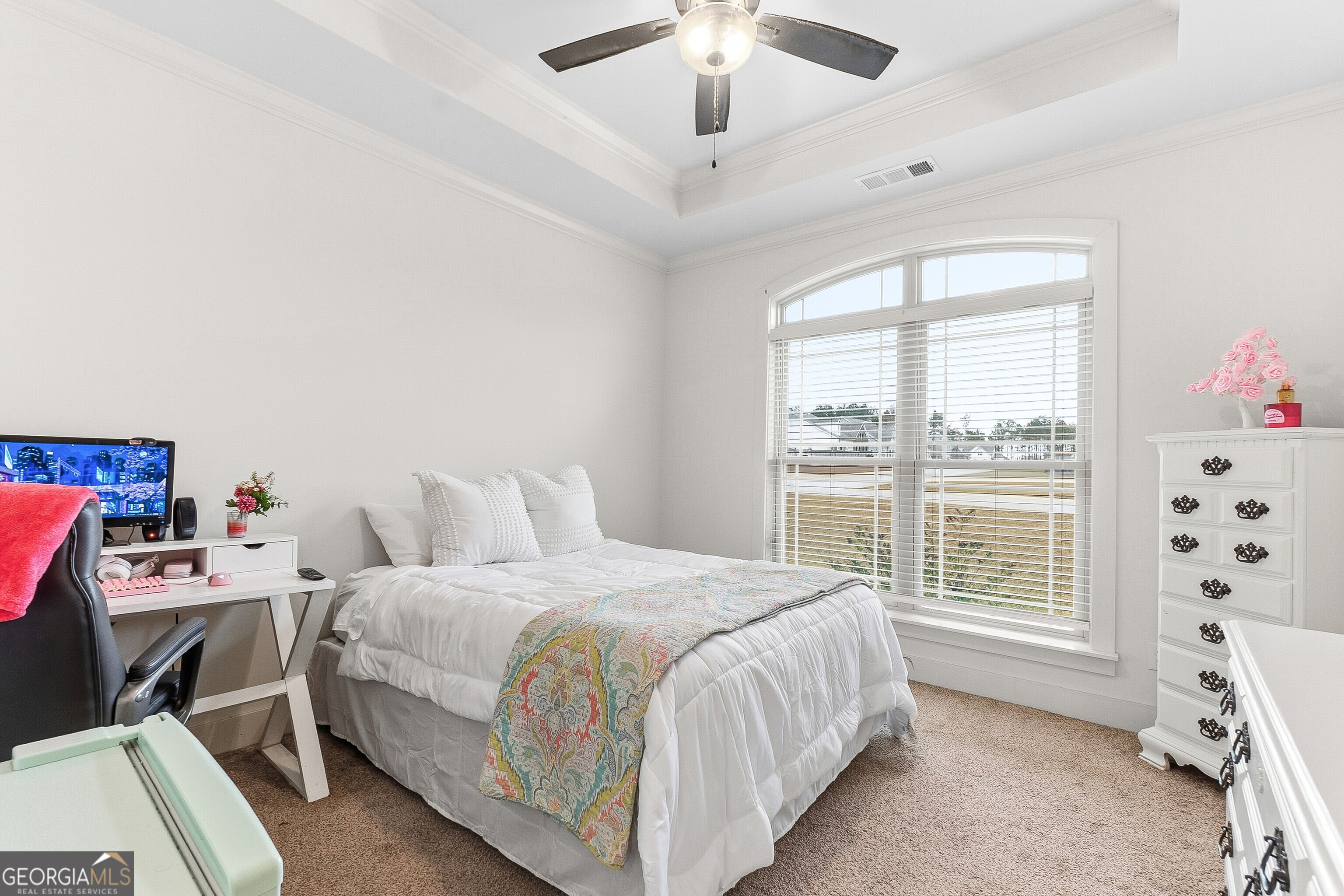 307 Apalachee Way Bonaire, GA 31005 - Photo 48 of 61 a bedroom with a bed and a window