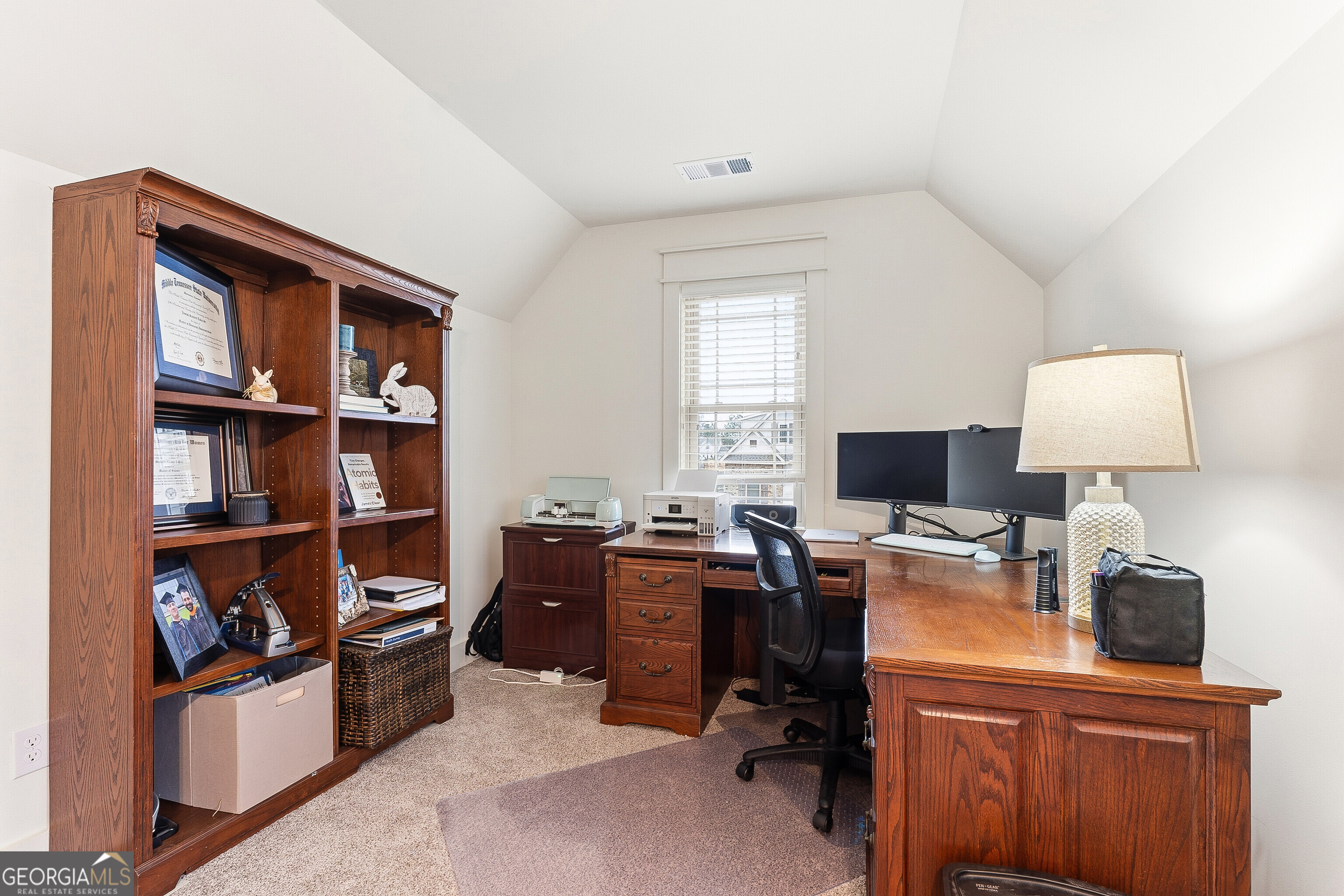 307 Apalachee Way Bonaire, GA 31005 - Photo 53 of 61 a view of a workspace with furniture and a window