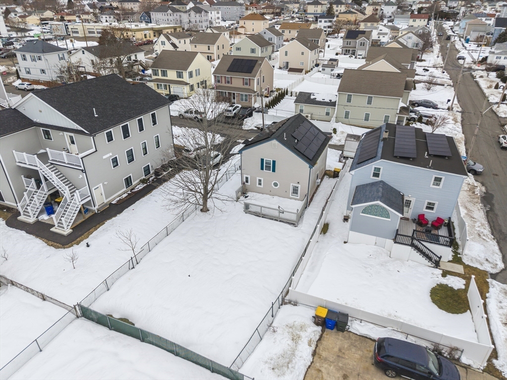 10 Aberdeen Street Fall River, MA 02721 - Photo 4 of 35 an aerial view of a house with swimming pool and sitting space