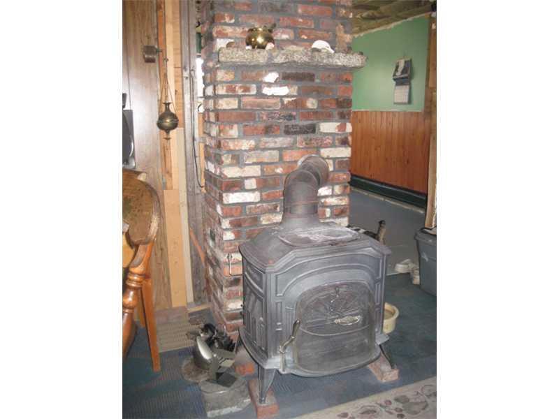 180 Sis Porter Road Sedgwick, ME 04676 - Photo 10 of 13 Other. Woodstove in Living Room