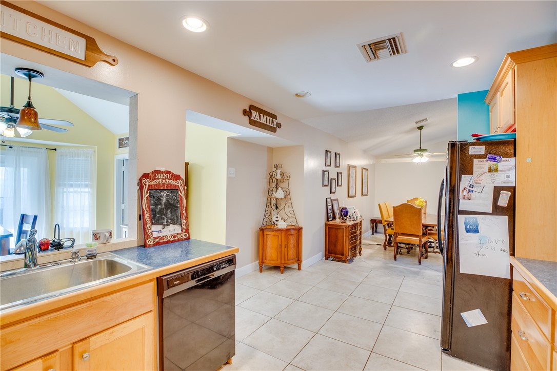 474 Azine Terrace Sebastian, FL 32958 - Photo 11 of 33 a living room with furniture and a large mirror