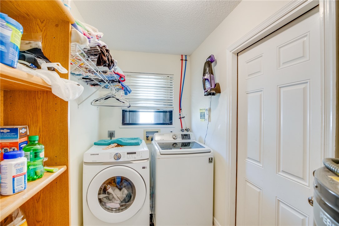 474 Azine Terrace Sebastian, FL 32958 - Photo 20 of 33 a utility room with dryer and washer