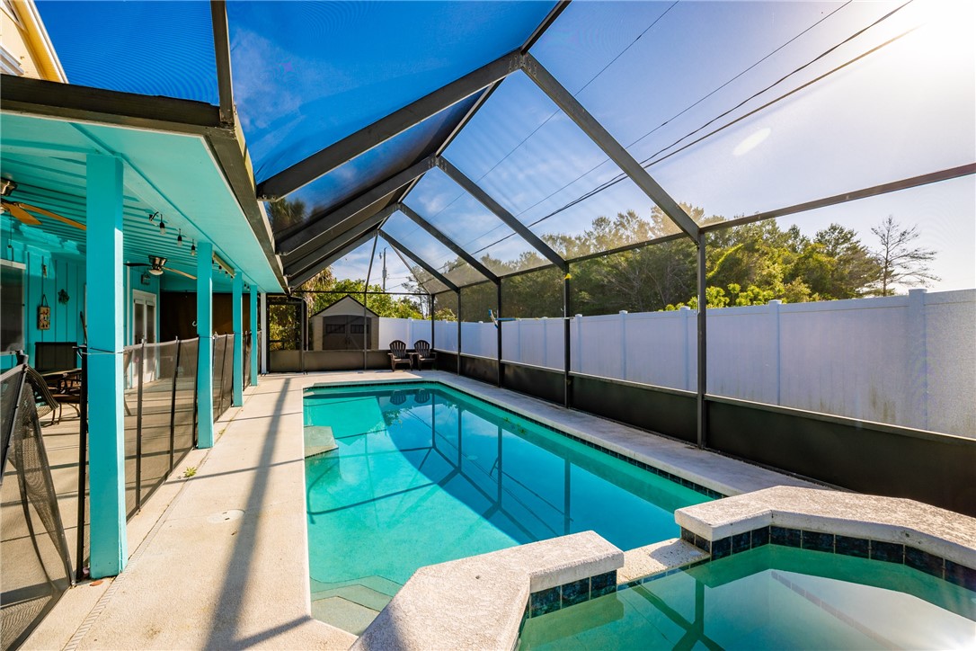 474 Azine Terrace Sebastian, FL 32958 - Photo 2 of 33 a view of a backyard with table and chairs