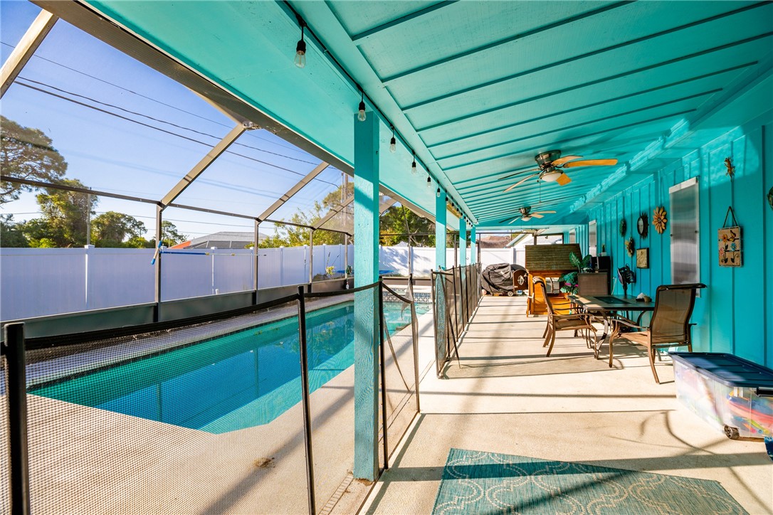 474 Azine Terrace Sebastian, FL 32958 - Photo 24 of 33 a view of a backyard with sitting area