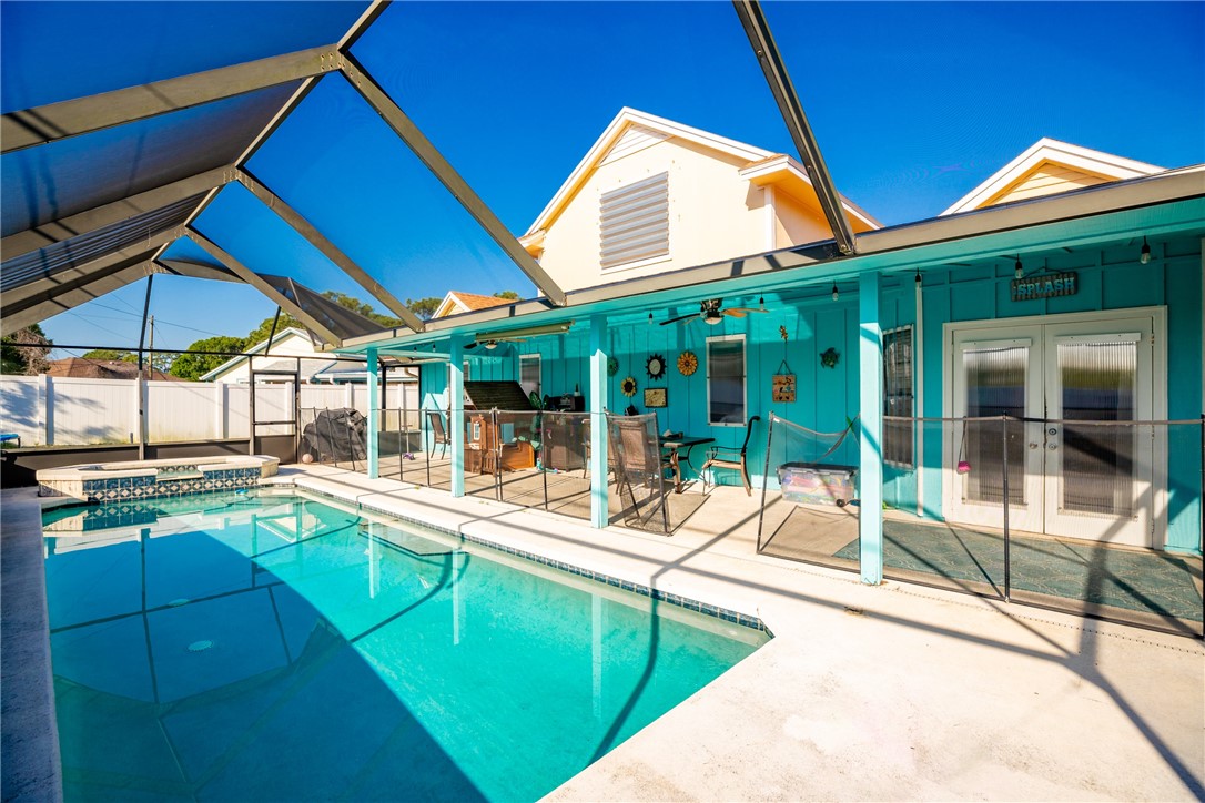474 Azine Terrace Sebastian, FL 32958 - Photo 26 of 33 a view of a house with pool and chairs