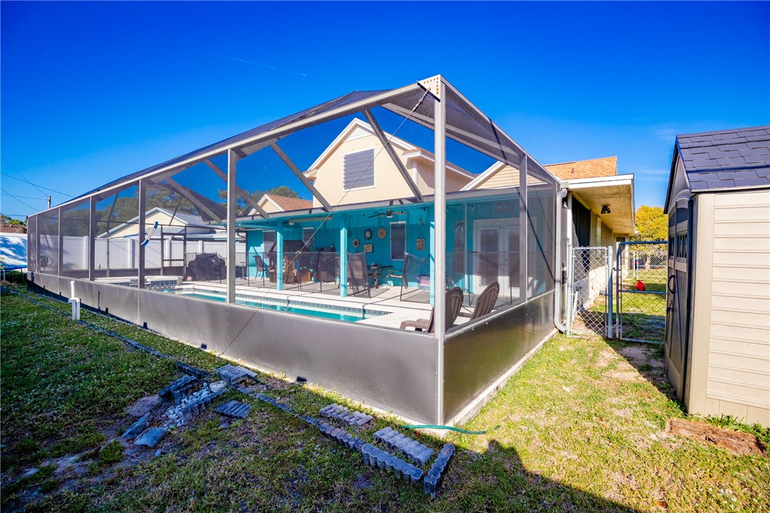 474 Azine Terrace Sebastian, FL 32958 - Photo 28 of 33 a view of house with swimming pool outdoor seating