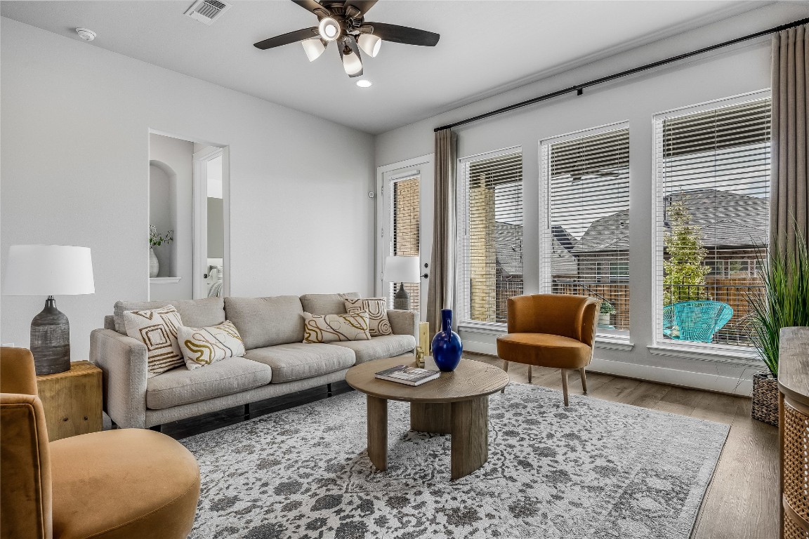200 Grn Knl Lane Georgetown, TX 78628 - Photo 11 of 32 a living room with furniture and a large window