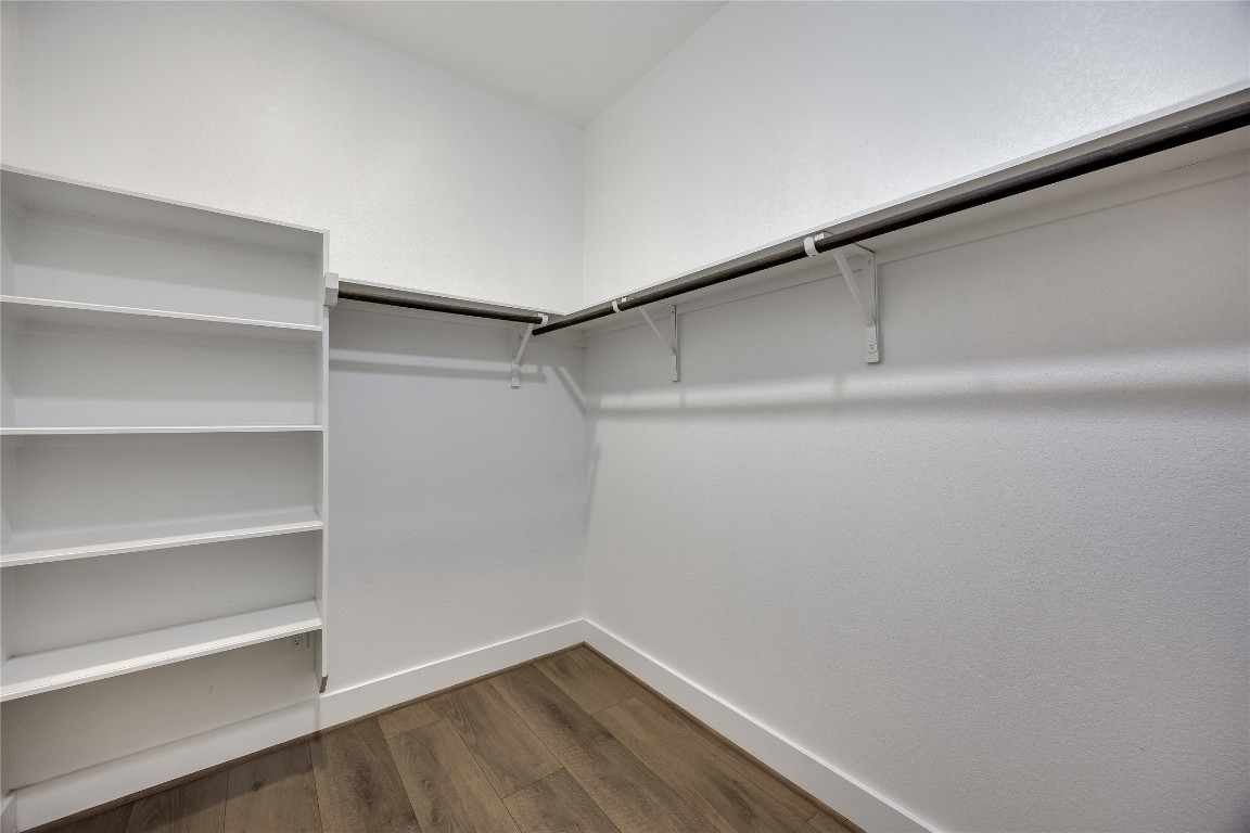 200 Grn Knl Lane Georgetown, TX 78628 - Photo 20 of 32 a view of a room with shelf on the wall