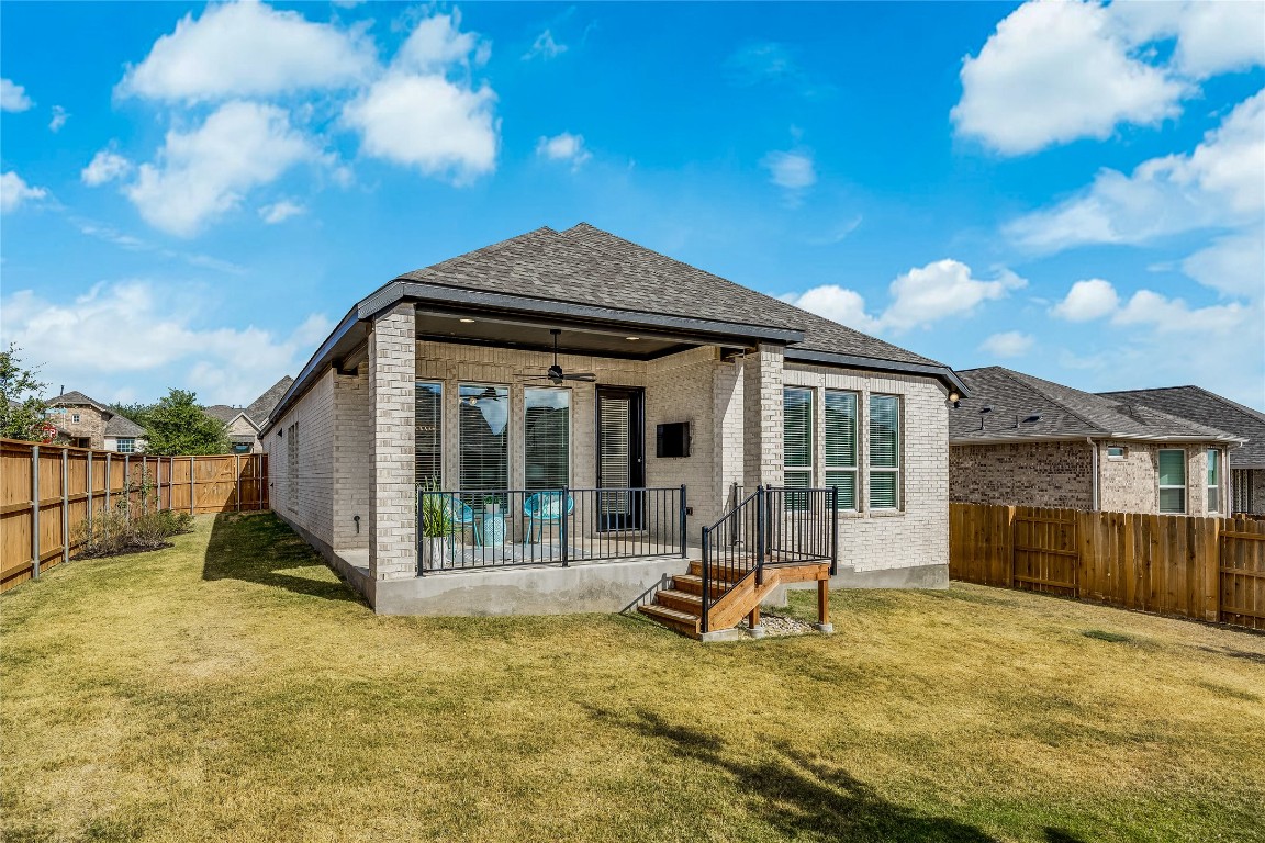200 Grn Knl Lane Georgetown, TX 78628 - Photo 29 of 32 a view of a house with backyard porch and sitting area