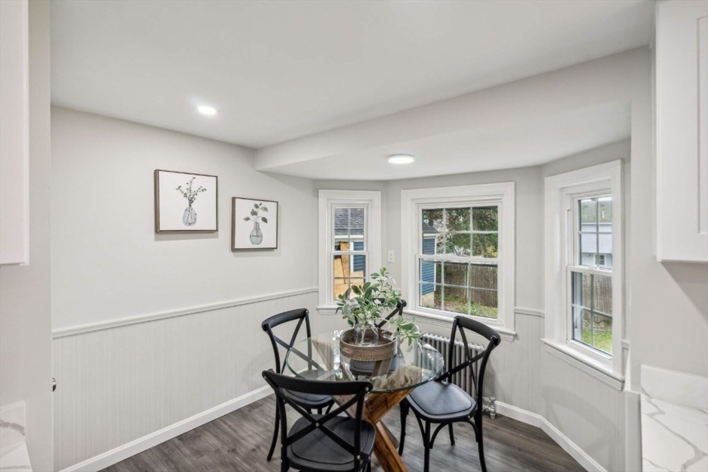 1 Arbor Road North Chelmsford, MA 01863 - Photo 13 of 40 a view of a dining room with furniture window and wooden floor