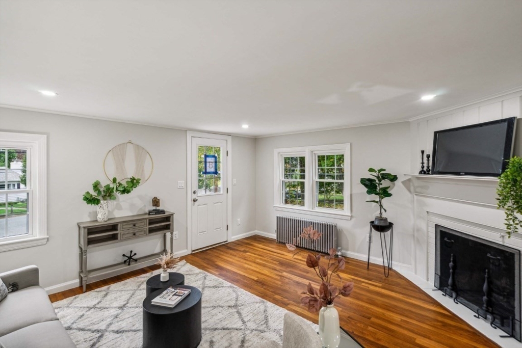 1 Arbor Road North Chelmsford, MA 01863 - Photo 17 of 40 a living room with furniture fireplace and window