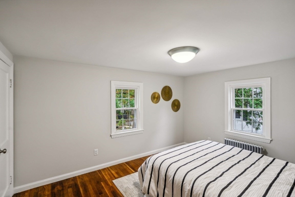1 Arbor Road North Chelmsford, MA 01863 - Photo 19 of 40 a bedroom with a bed and a window
