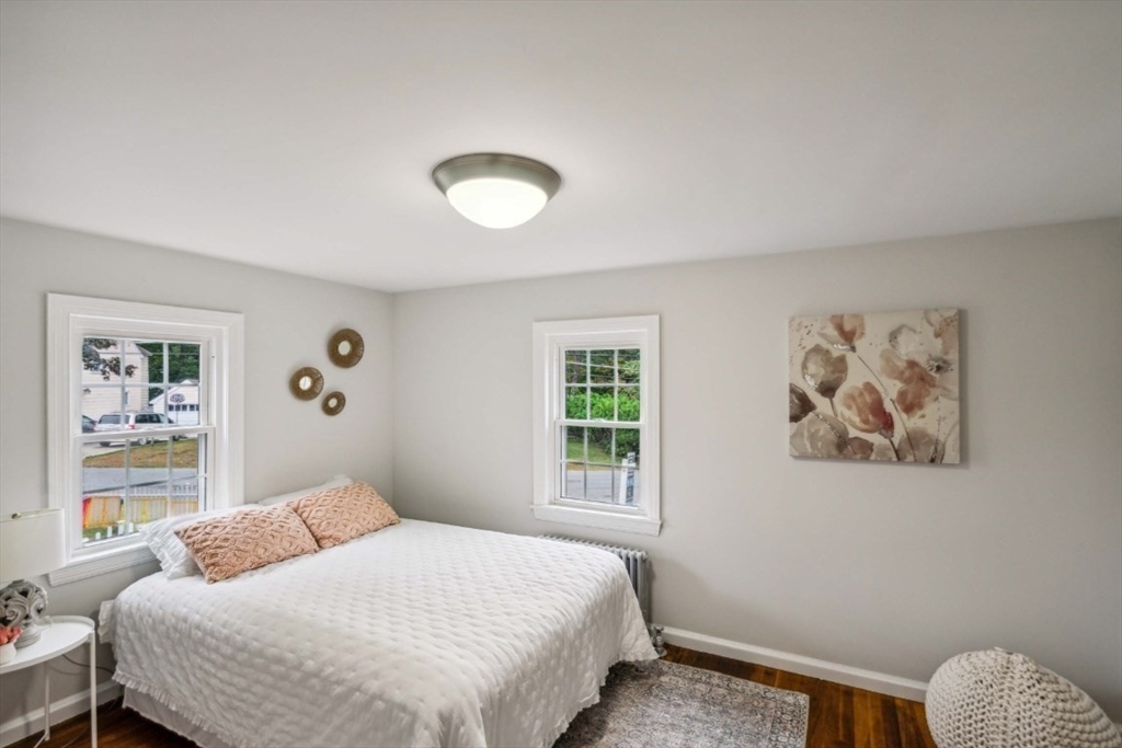 1 Arbor Road North Chelmsford, MA 01863 - Photo 20 of 40 a bedroom with a bed and a window