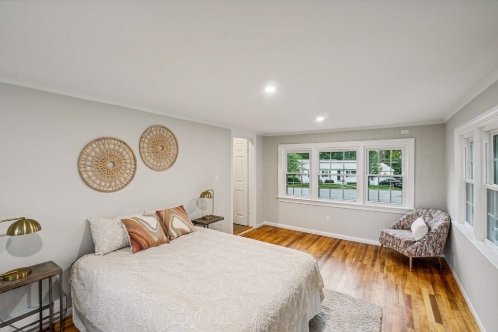 1 Arbor Road North Chelmsford, MA 01863 - Photo 27 of 40 a bedroom with a bed and a large window