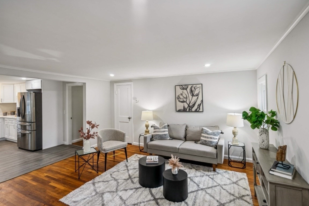 1 Arbor Road North Chelmsford, MA 01863 - Photo 3 of 40 a living room with furniture a couch and a potted plant