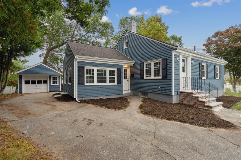1 Arbor Road North Chelmsford, MA 01863 - Photo 36 of 40 a view of a house with a yard